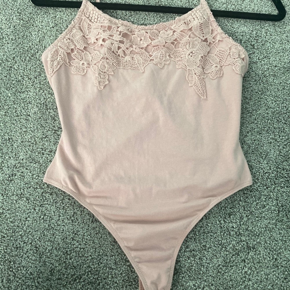 Pale pink bodysuit